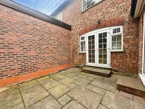 Rear of property/ Patio area - click for photo gallery